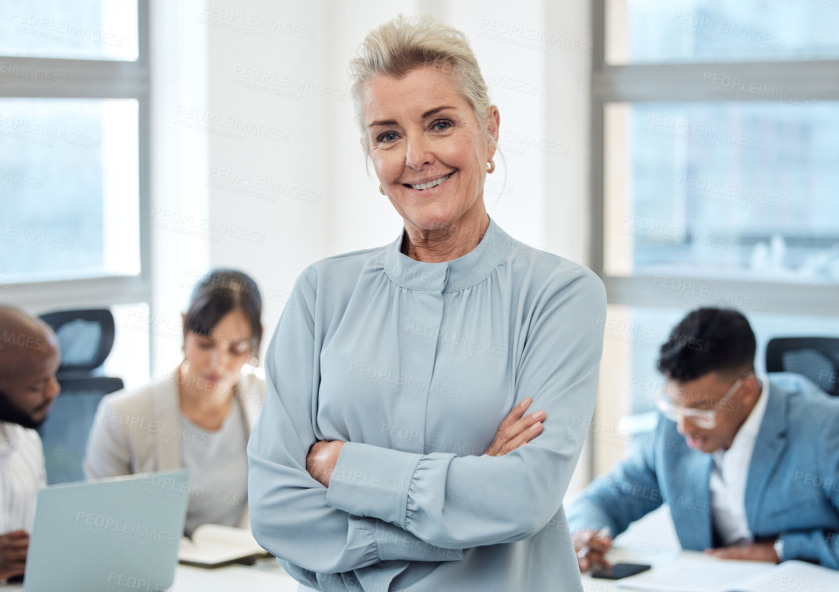 Buy stock photo Mature woman, portrait and leader with team in confidence for corporate or business management at office. Female person, CEO or boss with smile or arms crossed for leadership at company workplace