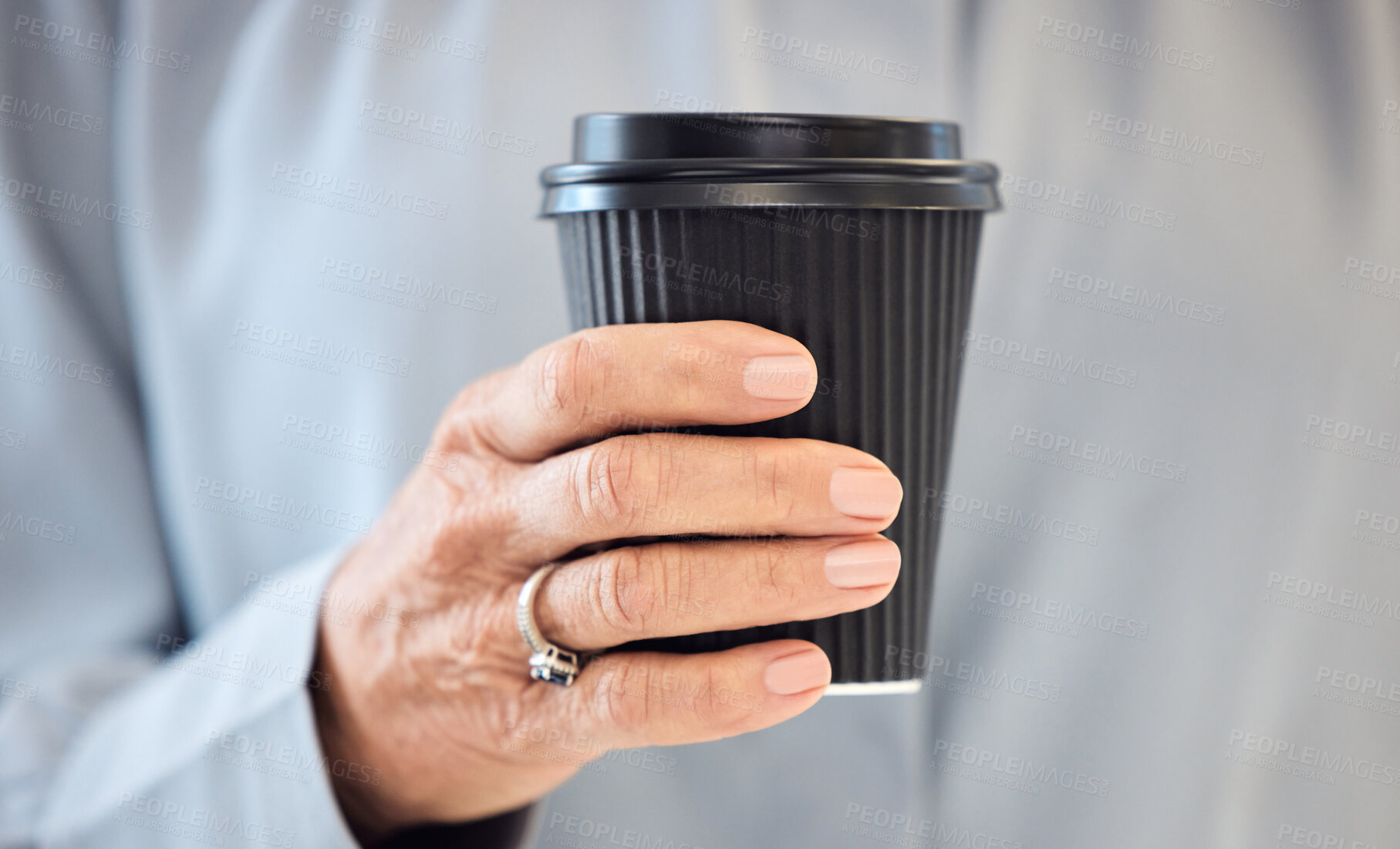 Buy stock photo Senior, hand and coffee for takeaway to drink, cafe and container for person, closeup and mockup. Cafeteria, liquid and latte for beverage in morning, breakfast and tea break in shop for caffeine