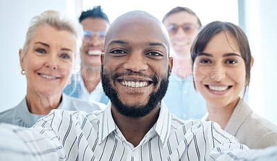 Buy stock photo Portrait of a group of confident businesspeople taking selfies together in an office