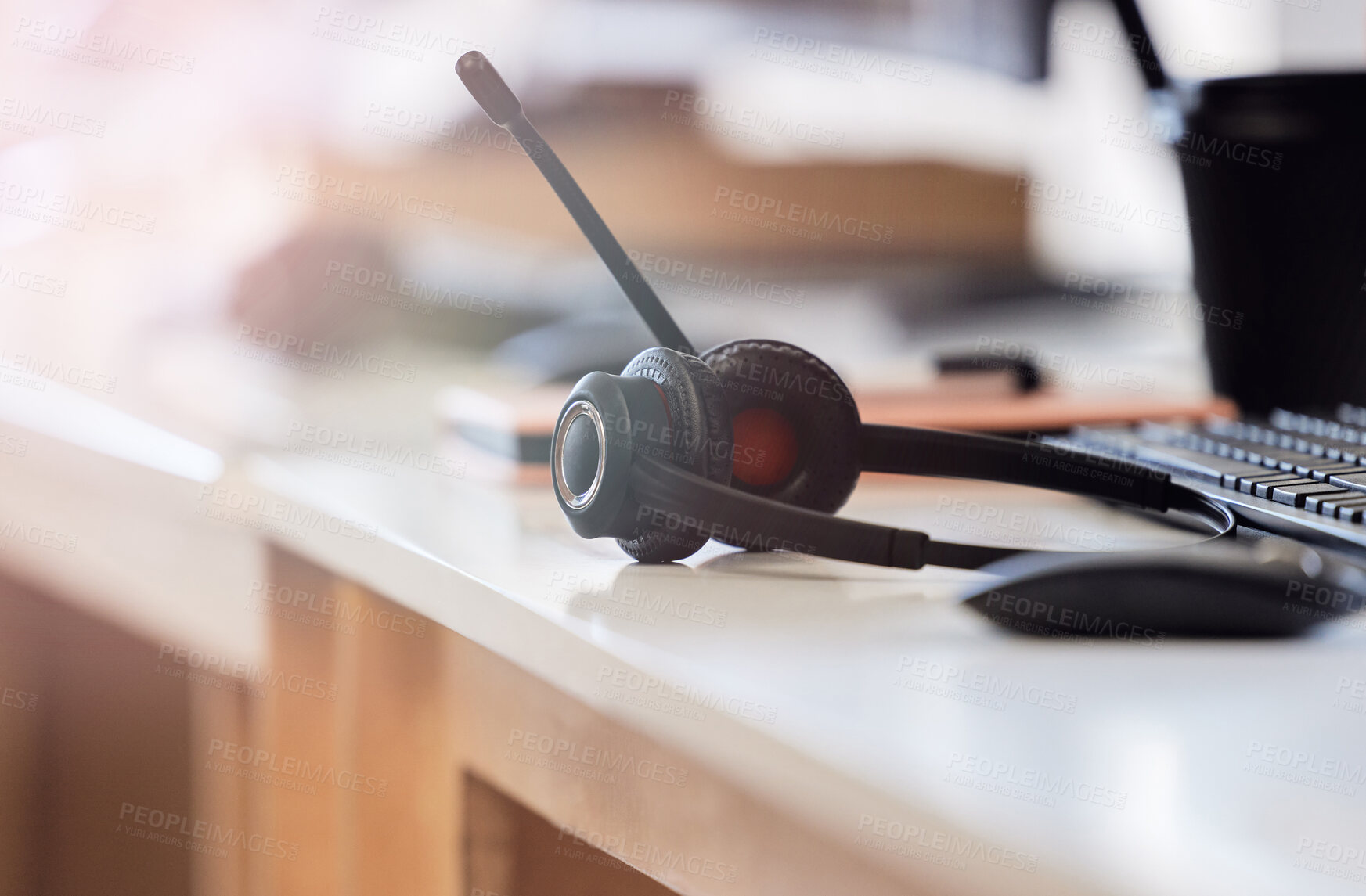 Buy stock photo Headphones, computer and desk with mic at call center for customer service, support or telemarketing at office. Empty workplace, CRM or equipment on table for telecom, communication or online advice