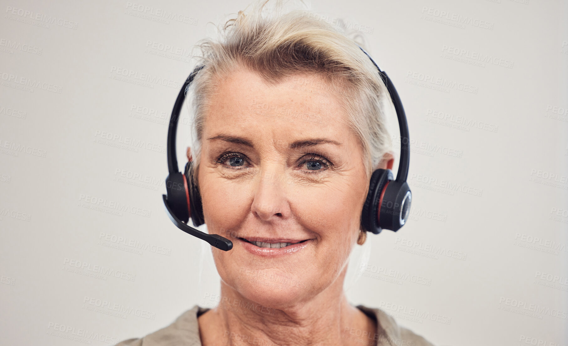 Buy stock photo Mature, portrait and happy woman with headphones in call center for customer service or telemarketing. Face of female person, consultant or agent with smile for online advice or virtual assistance