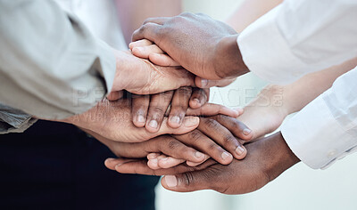 Buy stock photo Shot of a group of unrecognizable businesspeople standing with their hands stacked