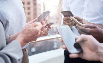 Buy stock photo Cropped shot of a group of unrecognizable businesspeople using their cellphones