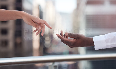 Buy stock photo Cropped shot of two people reaching out for each other's hand