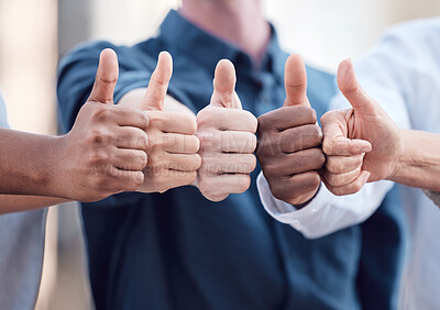 Buy stock photo Cropped shot of a group of unrecognizable businesspeople showing thumbs up