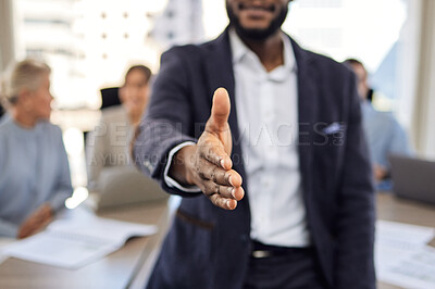 Buy stock photo Closeup shot of an unrecognisable businessman extending a handshake in an office