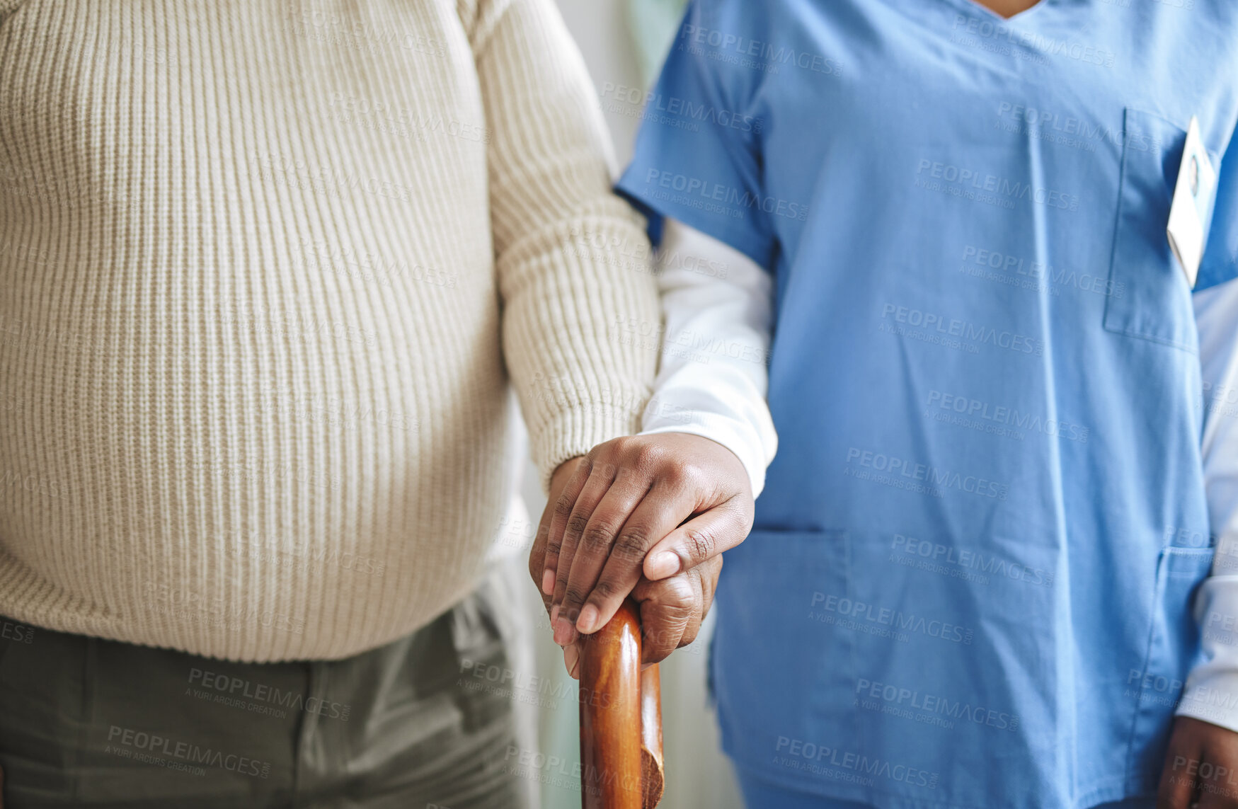 Buy stock photo Nurse, holding hands and senior patient with a cane for support, healthcare and kindness at nursing home. Person, caregiver and woman together for trust, elderly care and help in retirement 