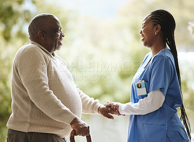 Buy stock photo Senior man, caregiver and holding hands for support, healthcare and happiness at retirement home. Elderly patient and black woman or nurse together for trust, hope and help for health and wellness 