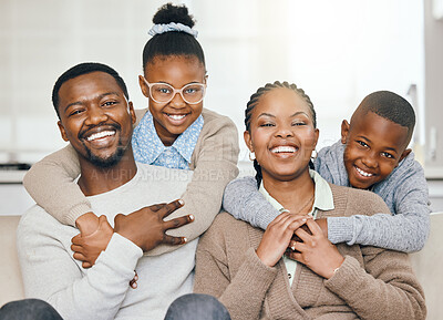 Buy stock photo Shot of a young family relaxing together at home