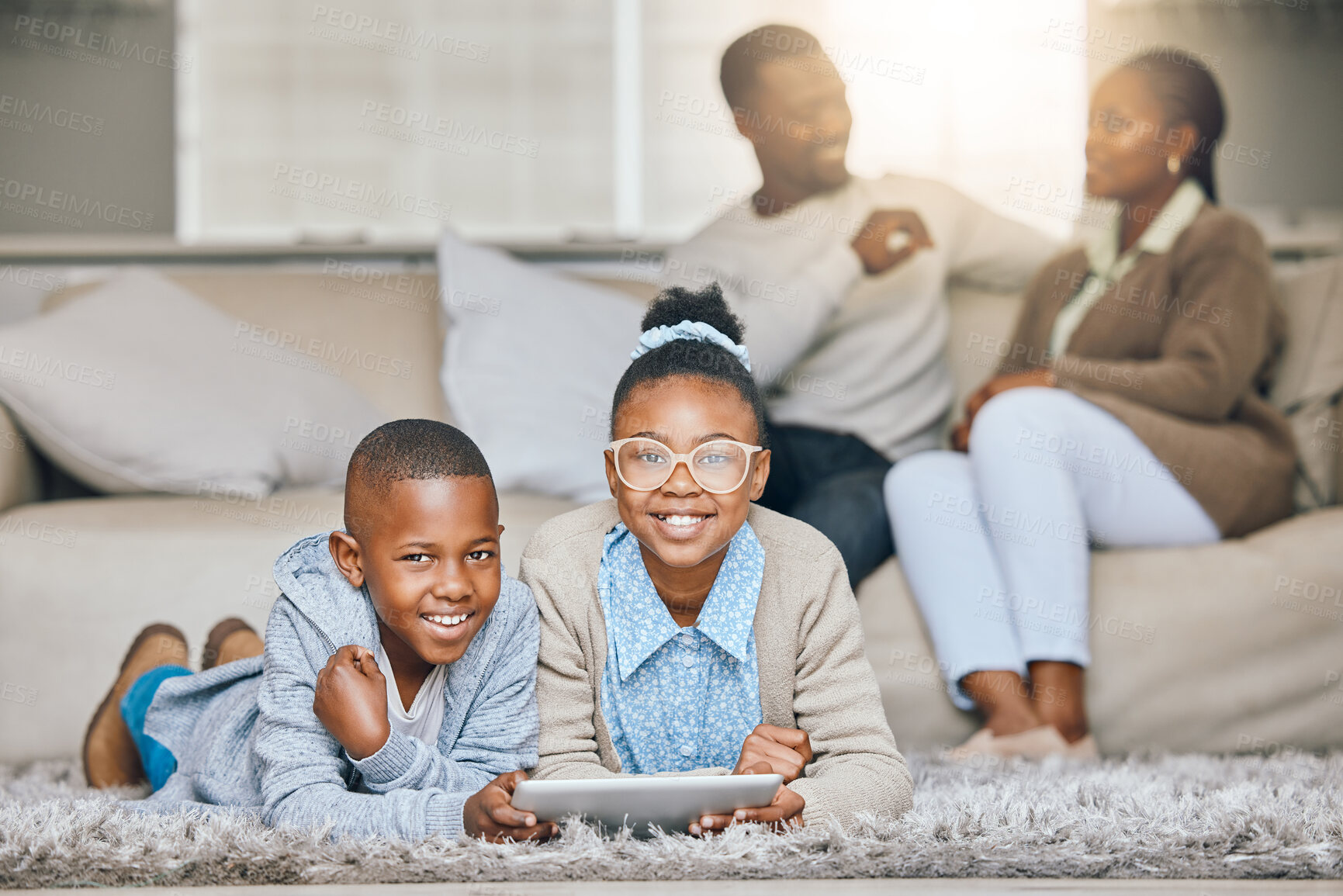 Buy stock photo Portrait, smile or brother and sister with tablet on floor of living room for gaming or streaming together. Black family, share and sibling children in apartment with parents to relax on weekend