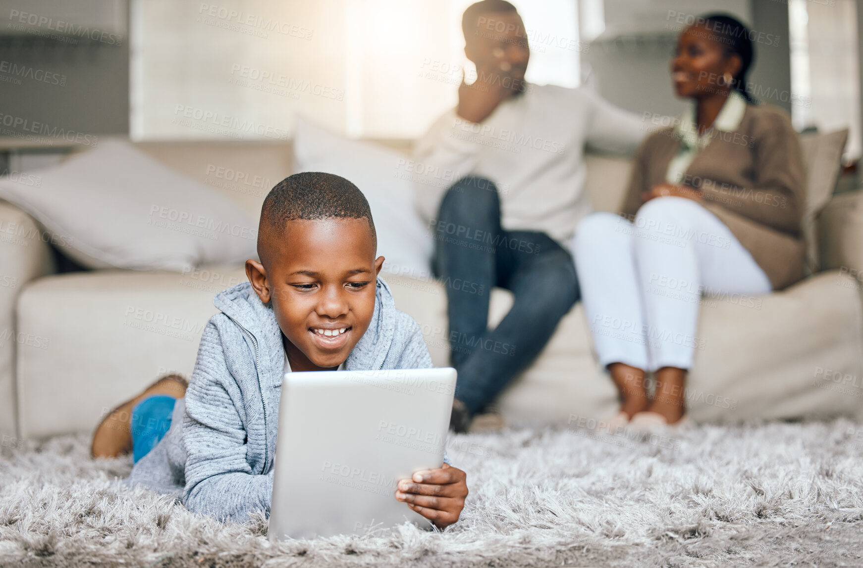 Buy stock photo Boy, relax and floor with tablet at house for streaming, education games and watch videos of learning. Child, black family and digital with online app, multimedia film and entertainment subscription