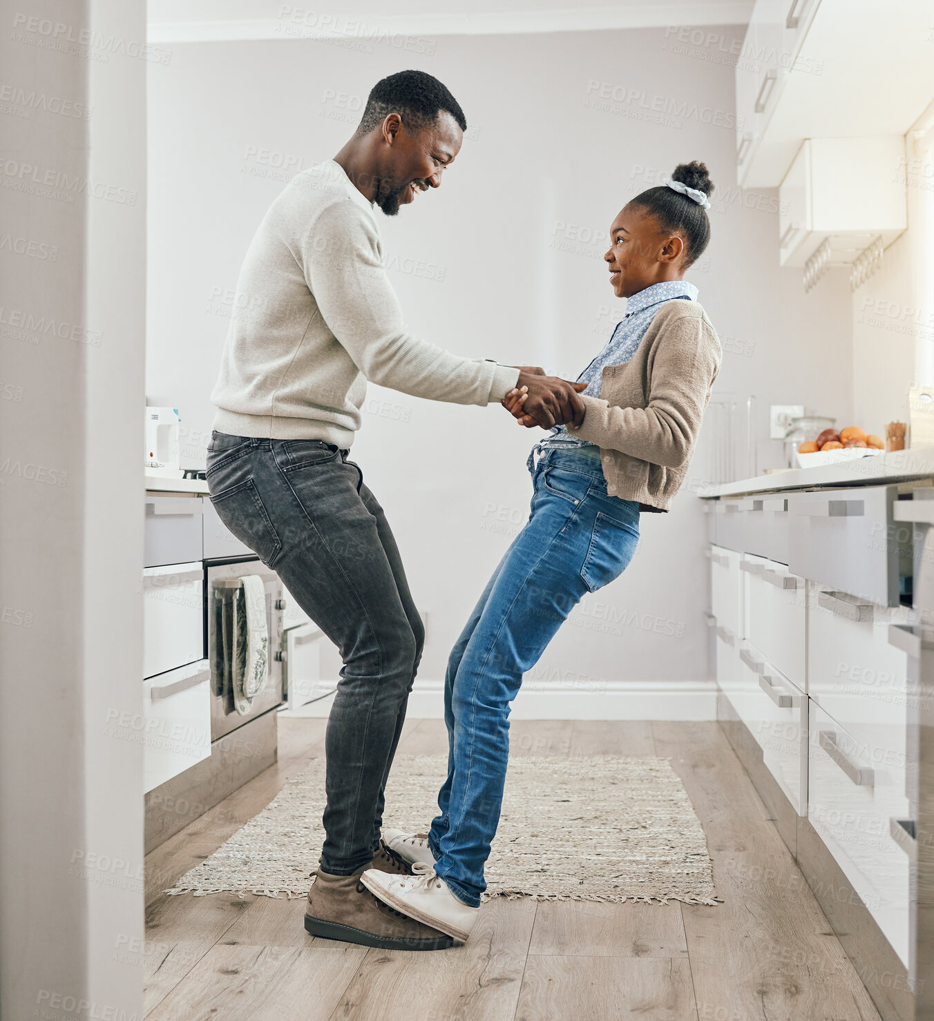 Buy stock photo House, dancing and father with girl in kitchen, love and bonding together with movement. Black family, single parent and dad with daughter, happiness and energy with support, smile and care with joy