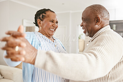 Buy stock photo Shot of an affectionate mature couple spending time together at home