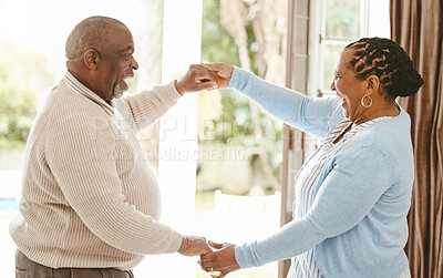 Buy stock photo Black couple, retirement and happy in home for dance, love and trust in relationship. Elderly woman, husband and holding hands for care with bonding, fun and excited for milestone with celebration