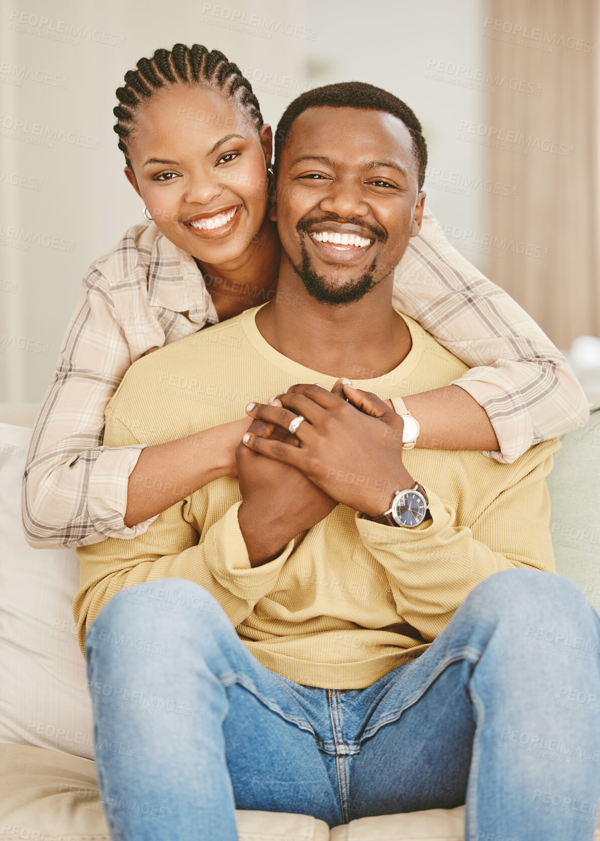 Buy stock photo Black couple, portrait and hug for love, trust and relationship with partner, security or bonding in house. Man, woman and happy for embrace, support and marriage with commitment, smile and romance