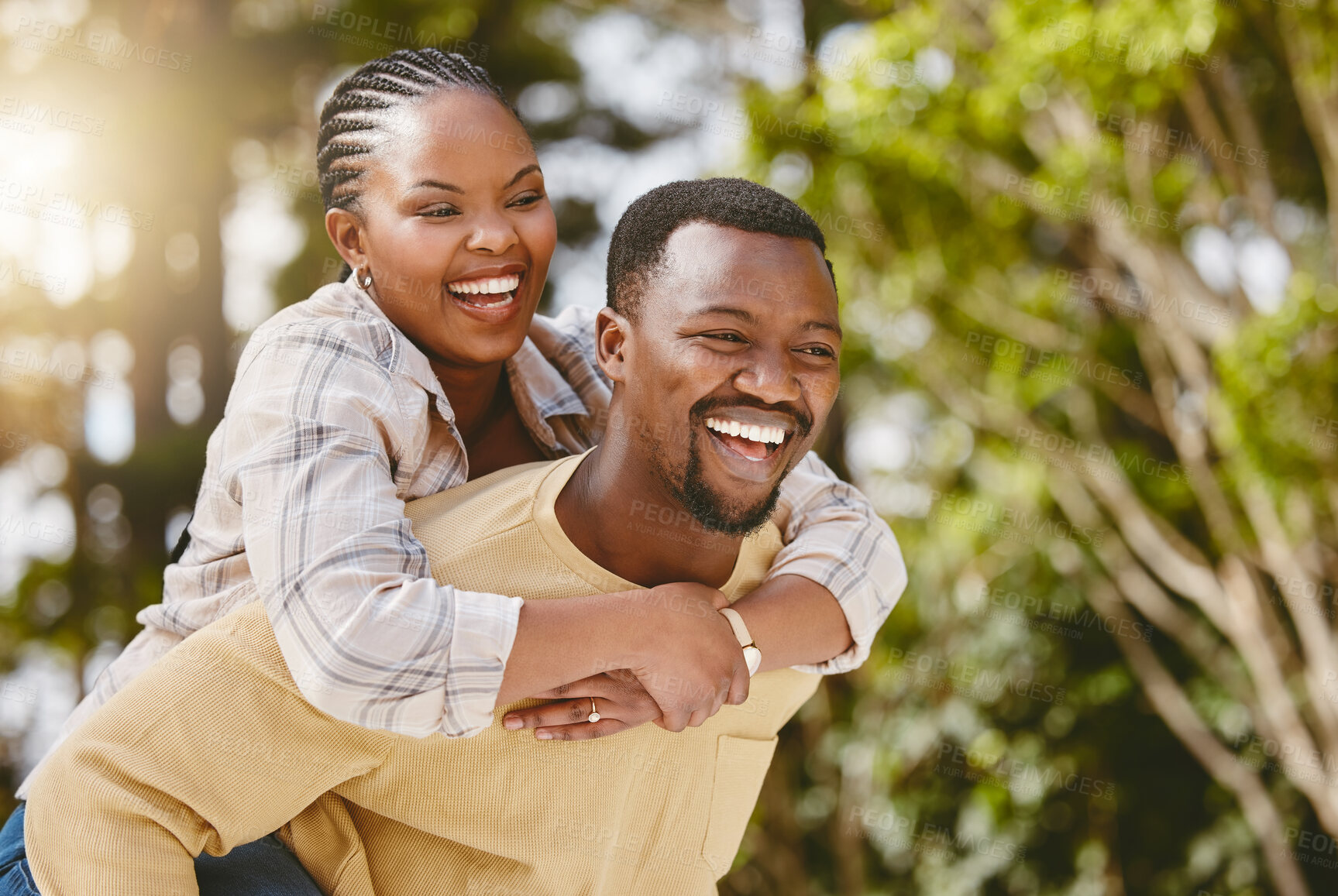 Buy stock photo Couple, piggyback and date outdoor for love, care and relationship with partner, fun and bonding. Man, woman and smile for embrace, support and trust with commitment, loyalty and playful anniversary