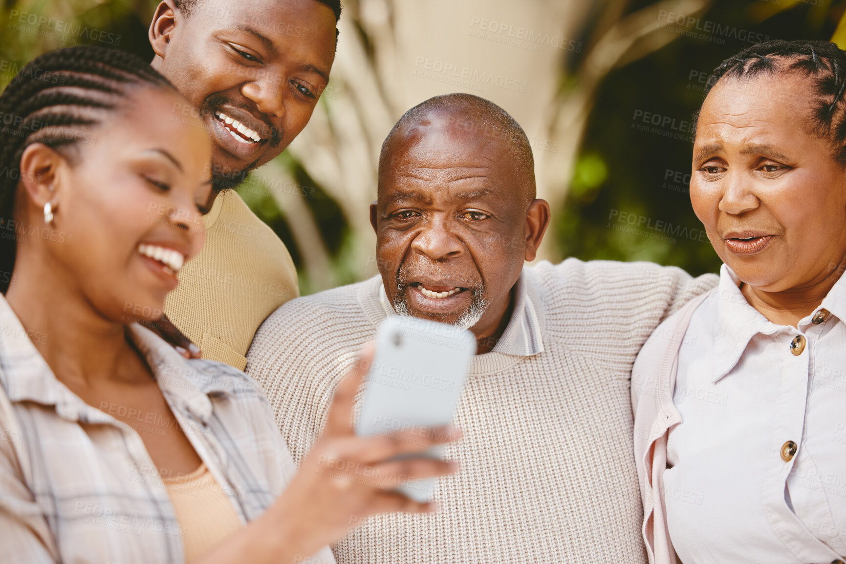 Buy stock photo Man, woman and senior parents with phone checking modern technology, social media or news. Smartphone, photography and black family with mobile app for digital memory, online search or home bonding