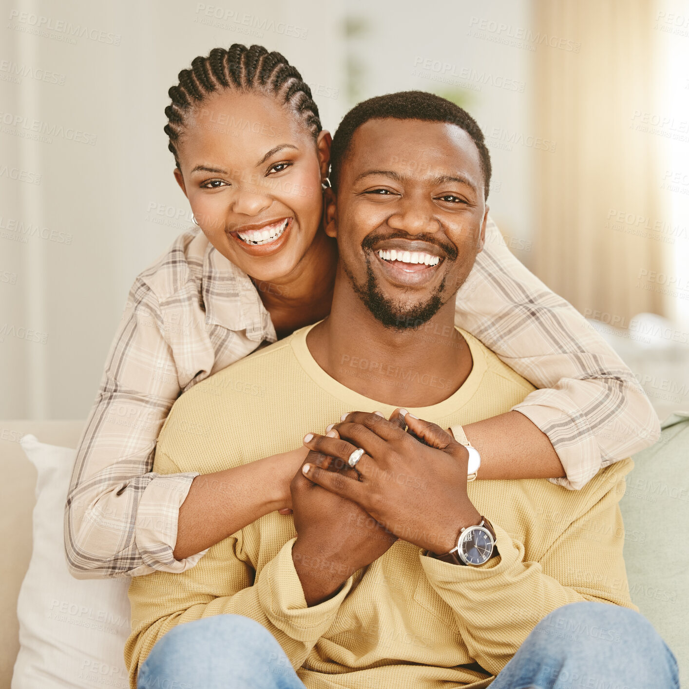 Buy stock photo Black couple, portrait and hug for love, care and relationship with partner, security or bonding in house. Man, woman and happy for embrace, relax and trust with support, smile and romance as loyalty