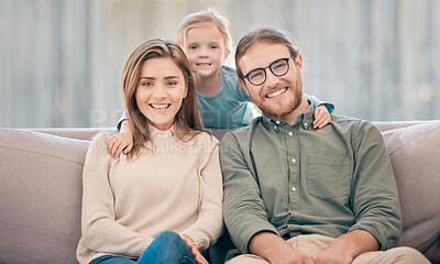 Buy stock photo Family, happy and portrait in house on sofa for relax, bonding and support with smile in lounge. Mother, father and girl in living room of home on couch for wellness, connection and memory with hug