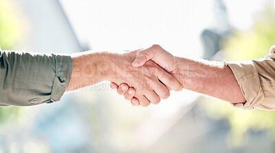 Buy stock photo Handshake, partnership and trust in care for support, retirement or agreement in deal, greeting or commitment. Hand of people shaking hands for love or teamwork together against a blurred background
