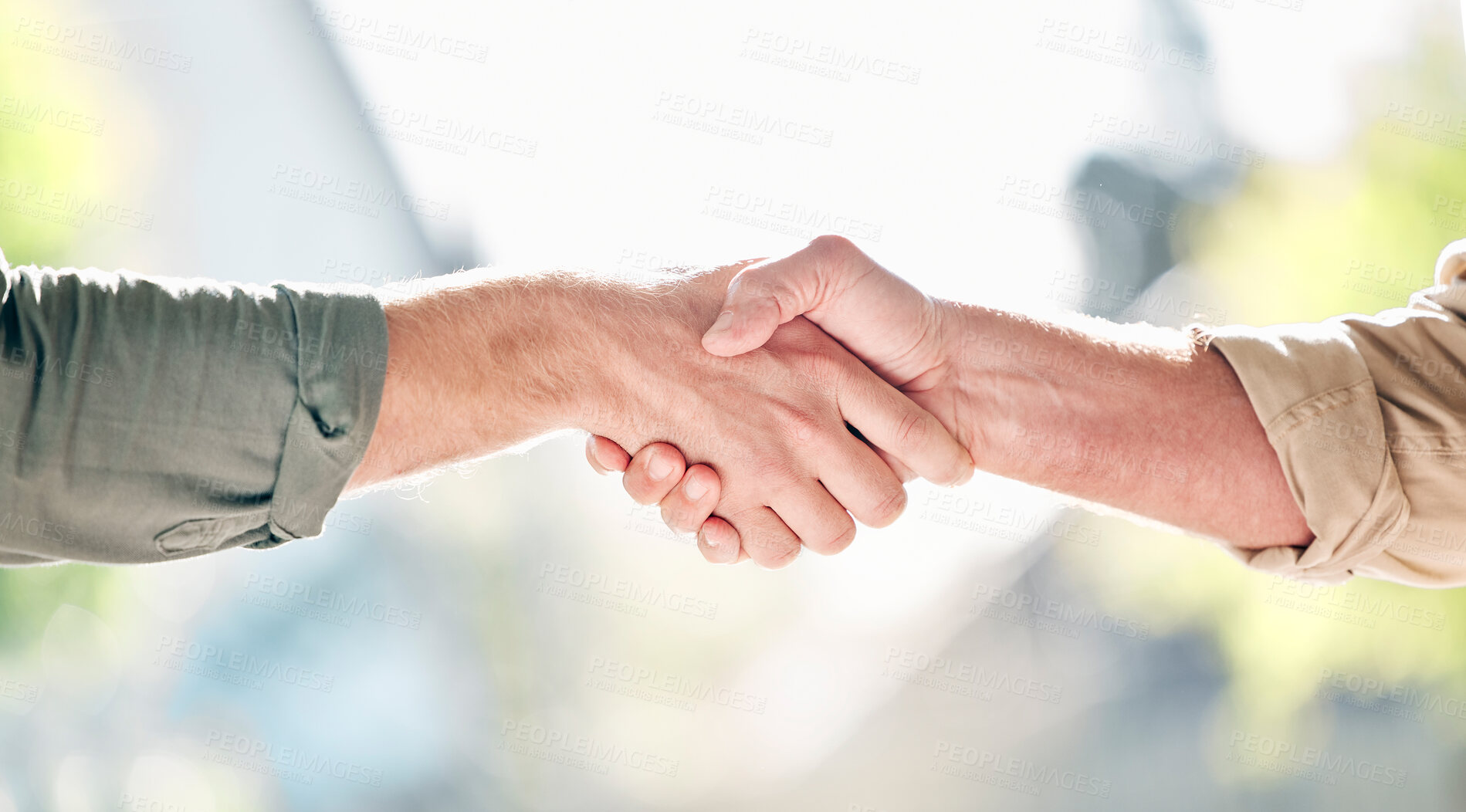 Buy stock photo Handshake, partnership and trust in care for support, retirement or agreement in deal, greeting or commitment. Hand of people shaking hands for love or teamwork together against a blurred background