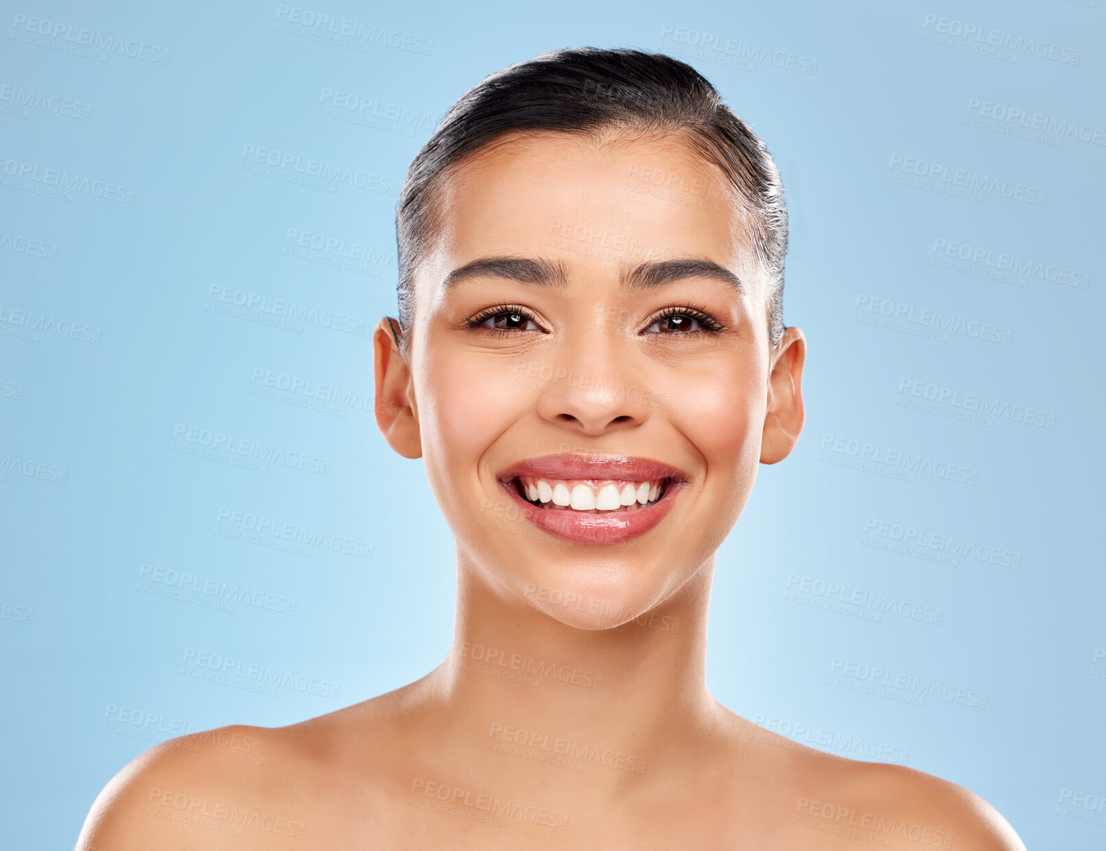 Buy stock photo Happy, skincare and face of woman in studio for beauty, shine and wellness or cosmetics. Portrait, smile and glow or results for dermatology, chemical peel and laser or facial by blue background 