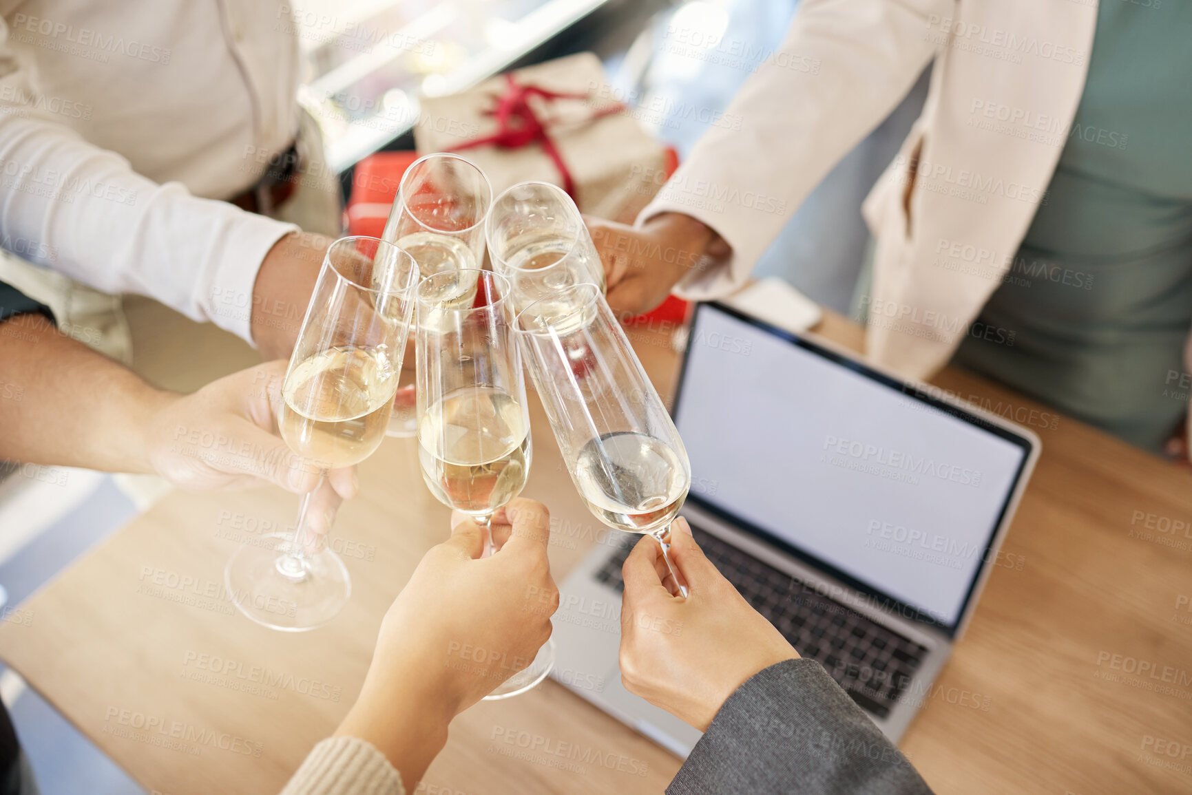 Buy stock photo Christmas, toast and hands with alcohol in office for party celebration, social gathering and company lunch. Team, laptop and group of people with champagne for festival drink, cheers and holiday