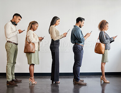 Buy stock photo Group, professional and cellphone standing in a line at a job interview at an agency or workplace. Business, people and waiting with mobile for job interview at a company for recruitment or hr.