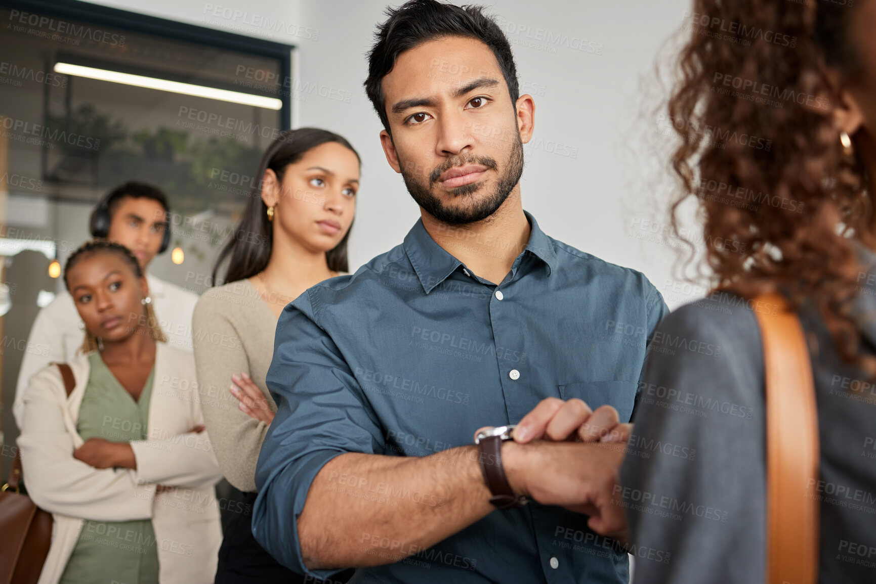 Buy stock photo Job interview, line and portrait of annoyed man with time, gesture or frustrated by waiting room delay. Recruitment, chaos and late business people at hr office for employment, disaster or crisis