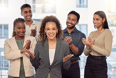 Buy stock photo Portrait, support and applause with a business team clapping for the achievement of a woman colleague in the office. Wow, win and motivation with a group of employees cheering for a female colleague