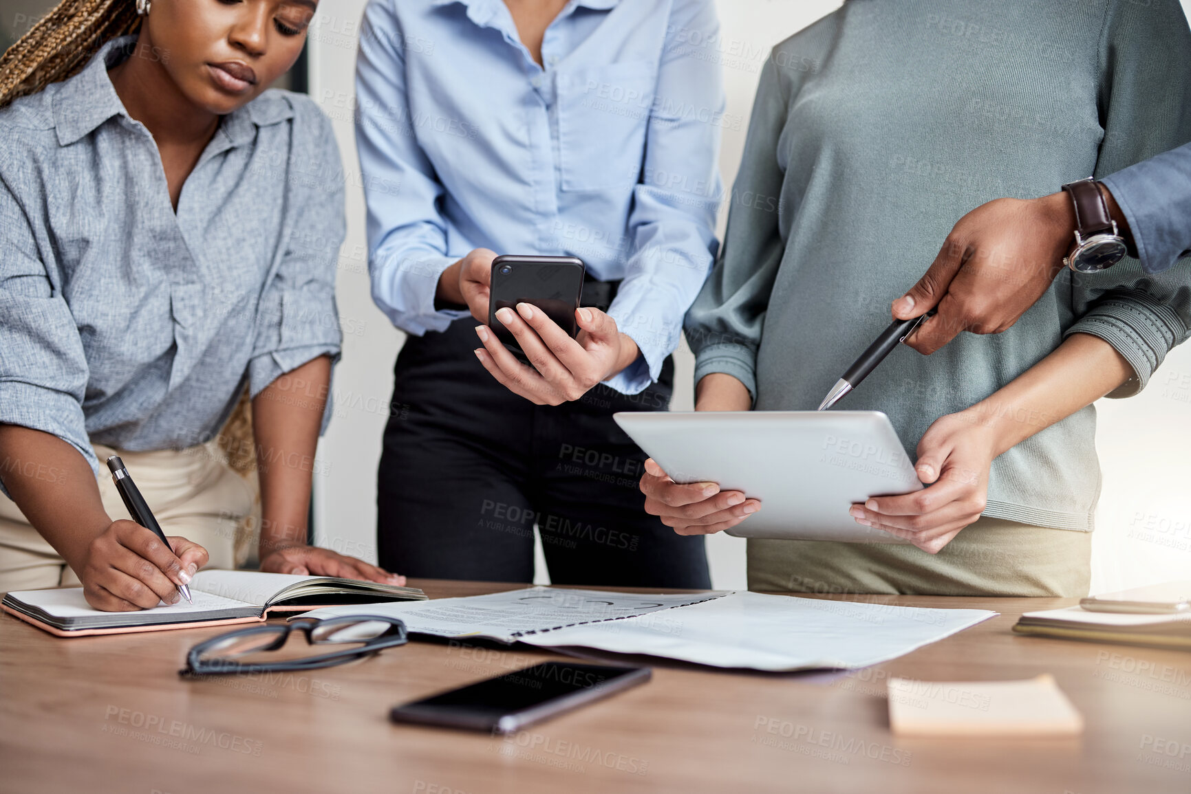 Buy stock photo Teamwork, tablet and hands of business people in meeting for planning, working and brainstorming ideas. Corporate, office and diversity and women in discussion with digital tech, documents or project