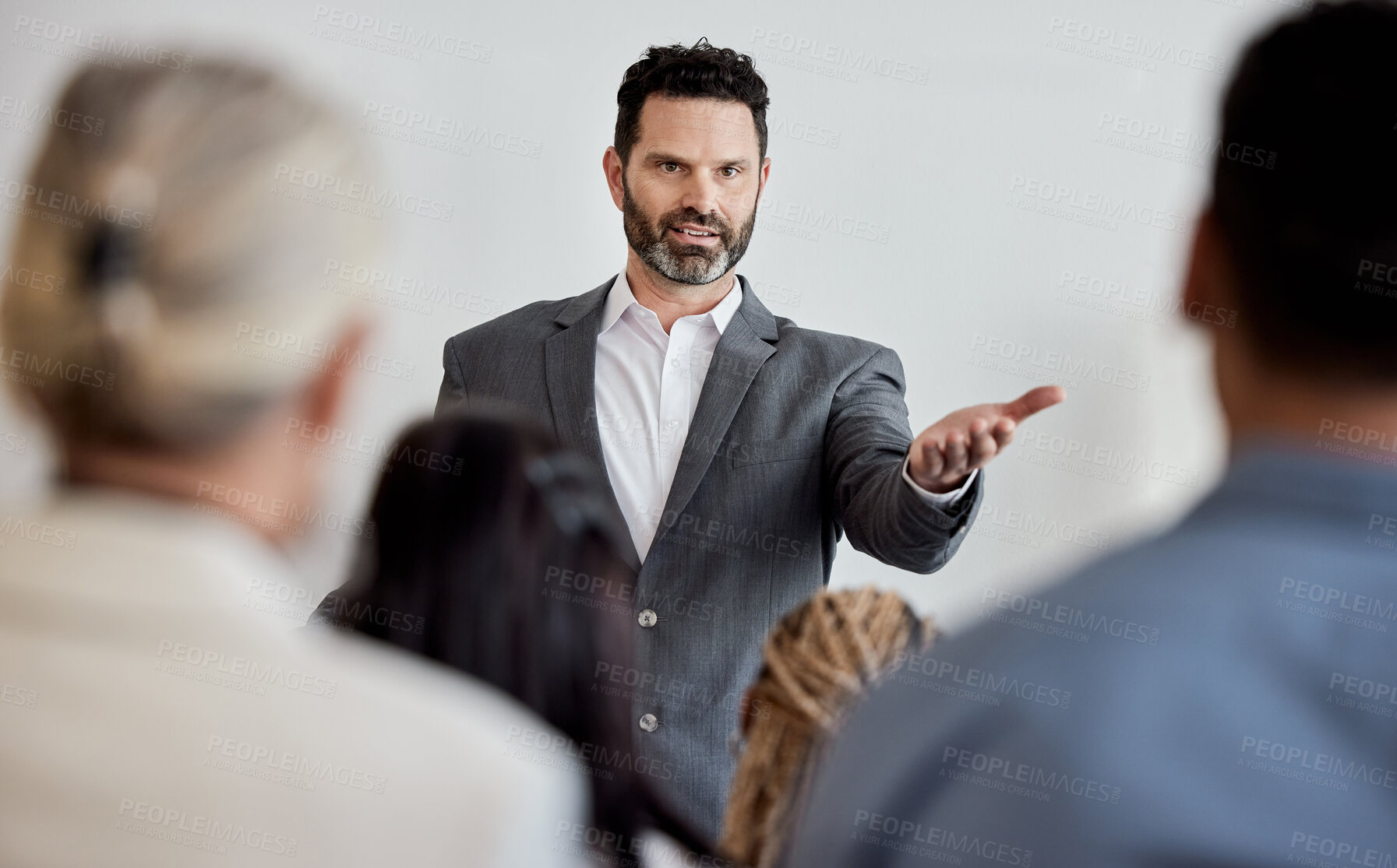 Buy stock photo Shot of a mature man delivering a presentation