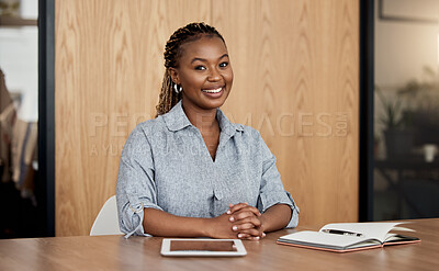 Buy stock photo Shot of a confident businesswoman sitting in her office
