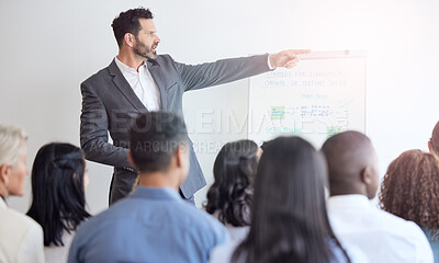 Buy stock photo Cropped shot of a businessman giving a presentation during a seminar in the conference room