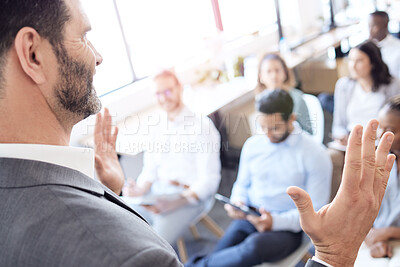 Buy stock photo Presentation, speaker hands and business people in audience at a conference, seminar or corporate workshop. Professional presenter man talk or speech for crowd at convention, training or trade show
