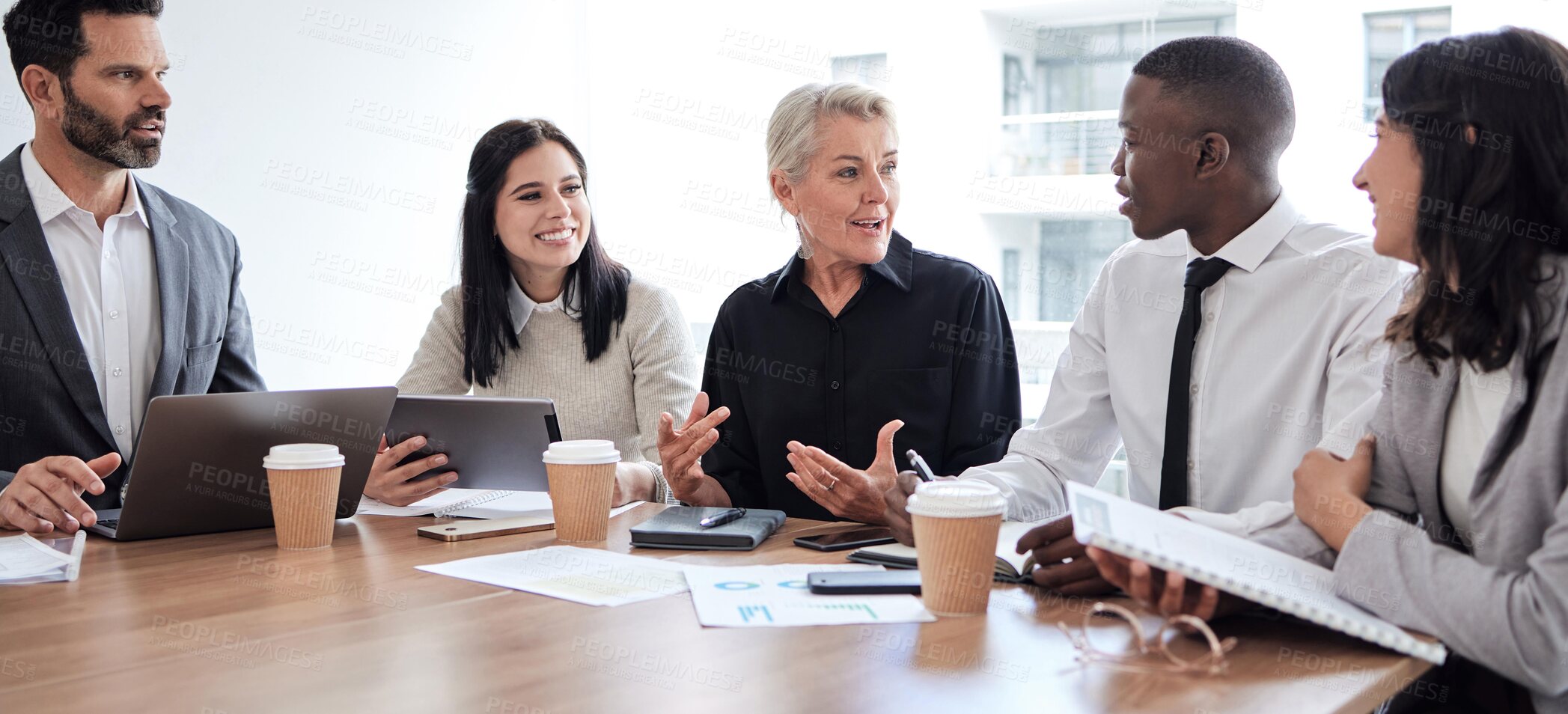 Buy stock photo Business people, meeting and professional team talking in a corporate office for brainstorming. Diversity men and women at a table for planning, discussion and strategy with technology and ideas