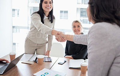Buy stock photo Meeting, handshake and thank you with business women in the boardroom for a b2b partnership or deal. Welcome, planning and support with happy female colleagues shaking hands in agreement at work