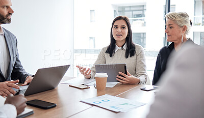 Buy stock photo Shot of a group of businesspeople in a meeting at work