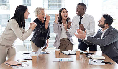Buy stock photo Shot of a group of businesspeople cheering in a meeting at work