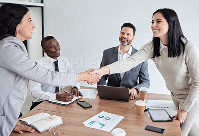 Buy stock photo Meeting, welcome and business women shaking hands in the boardroom for a b2b partnership or deal. Thank you, handshake and support with happy female colleagues in agreement while planning at work