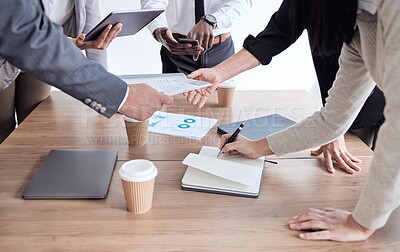 Buy stock photo Shot of a group of unrecognizable businesspeople busy in a meeting at work