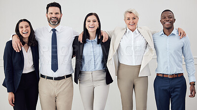 Buy stock photo Shot of a group of confident businesspeople standing together in an office
