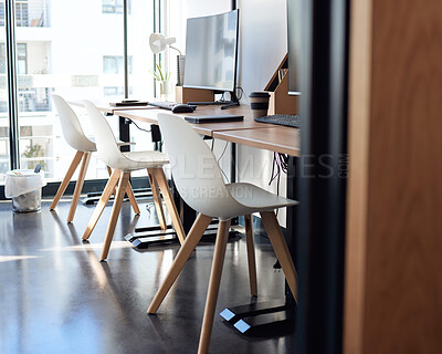Buy stock photo Shot of an empty workspace at an office