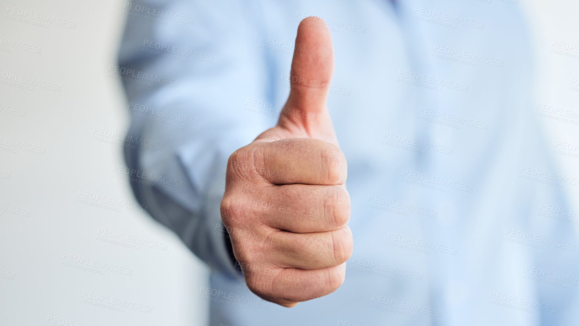 Buy stock photo Person, thumbs up and hand of businessman, office and agreement, approval or positive gesture. Happy, successful and professional male employee with a thank you, achievement and corporate growth