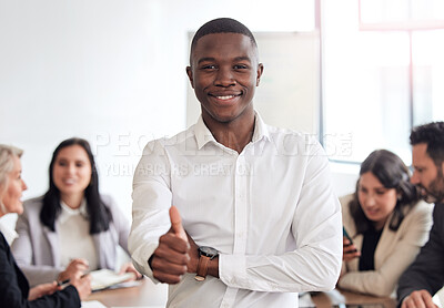Buy stock photo Shot of a young businessman standing with his arms crossed during a meeting at work