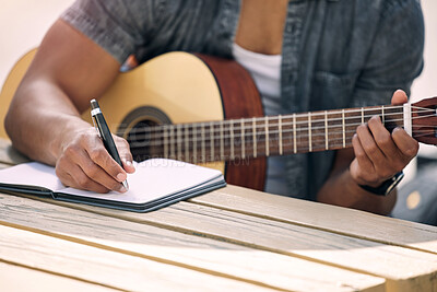 Buy stock photo Cropped shot of an unrecognizable man playing guitar