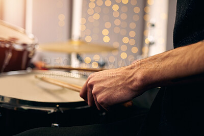 Buy stock photo Man, hands and music with drums, instrument and festival with closeup, rock and roll with talent. Person, artist or guy with equipment, culture or concert with sound, entertainment or sticks with fun