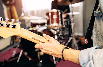 Buy stock photo Cropped shot of an unrecognizable man playing guitar