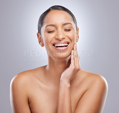 Buy stock photo Happy, skincare and woman with confidence in studio for spa treatment, cosmetics and self care. Female person, eyes closed and smile with pride for dermatology, glow and shine on gray background