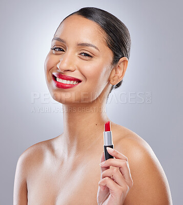 Buy stock photo Woman, lipstick and studio with portrait, smile and cosmetic or makeup on white background. Cosmetology, face or skincare for facial treatment with tool, product and lip application for female person